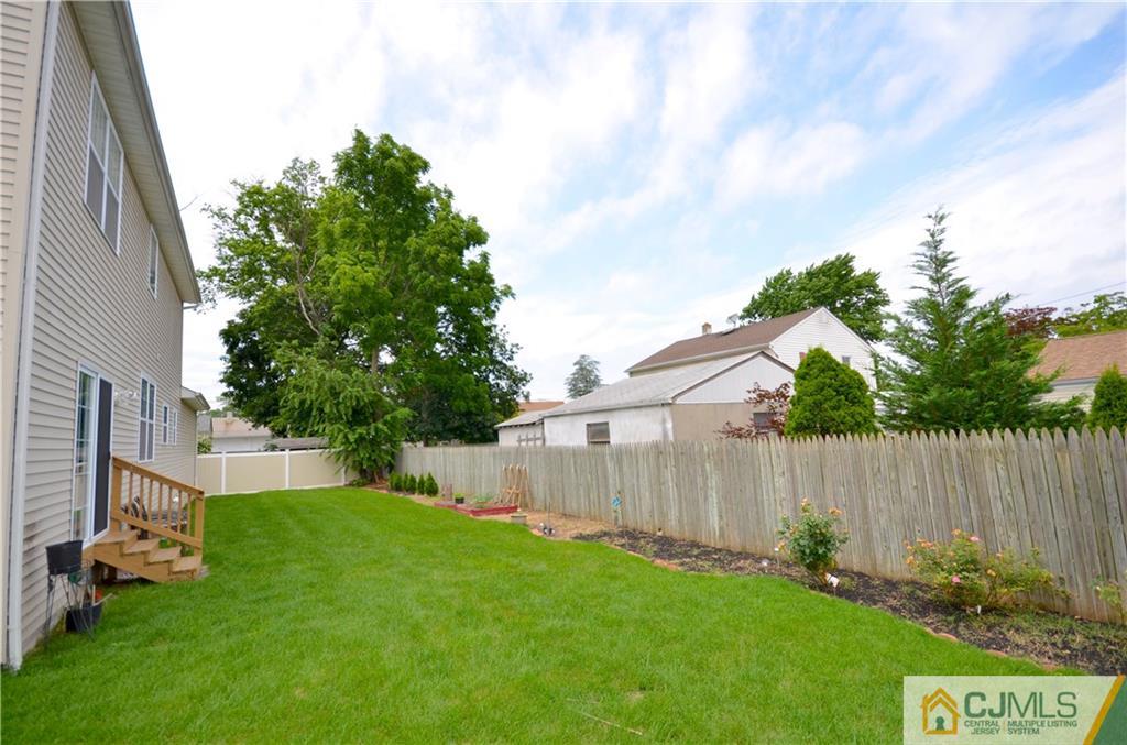 973 Clark Road North Brunswick, NJ 08902 - Photo 22 of 22 a view of a backyard with a garden