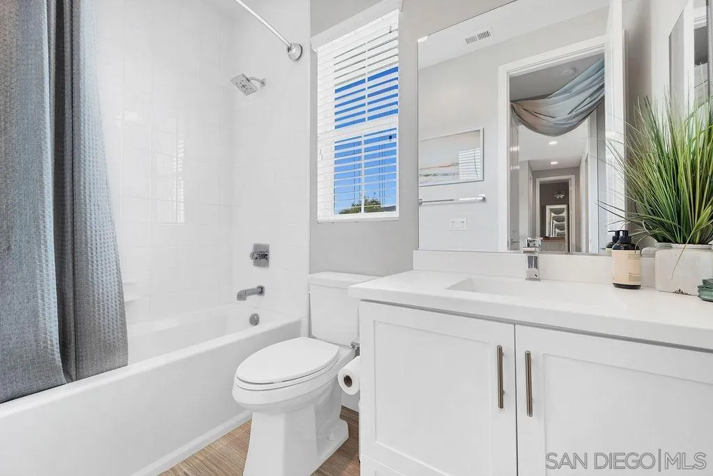 896 Channel Island Drive Encinitas, CA 92024 - Photo 28 of 51 a bathroom with a sink a toilet and shower