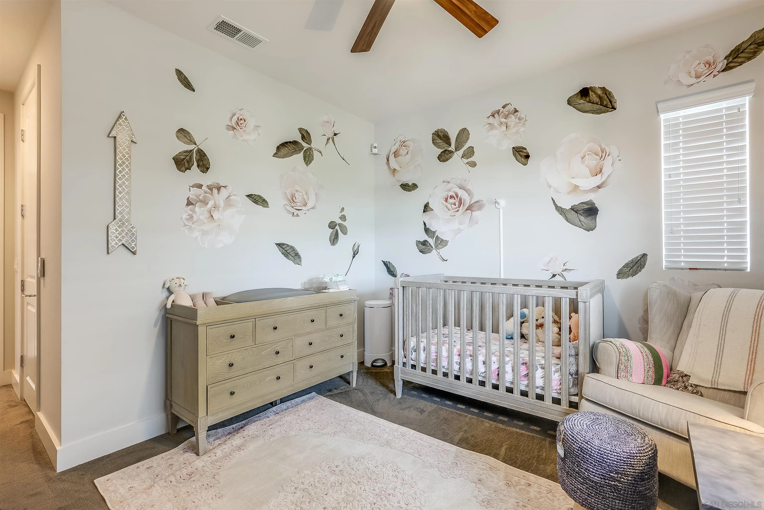 896 Channel Island Drive Encinitas, CA 92024 - Photo 33 of 51 a bedroom with baby crib and furniture