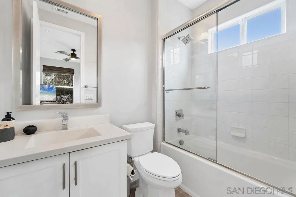 896 Channel Island Drive Encinitas, CA 92024 - Photo 35 of 51 a bathroom with a sink toilet and shower