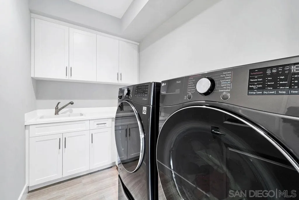 896 Channel Island Drive Encinitas, CA 92024 - Photo 40 of 51 a utility room with dryer and washer