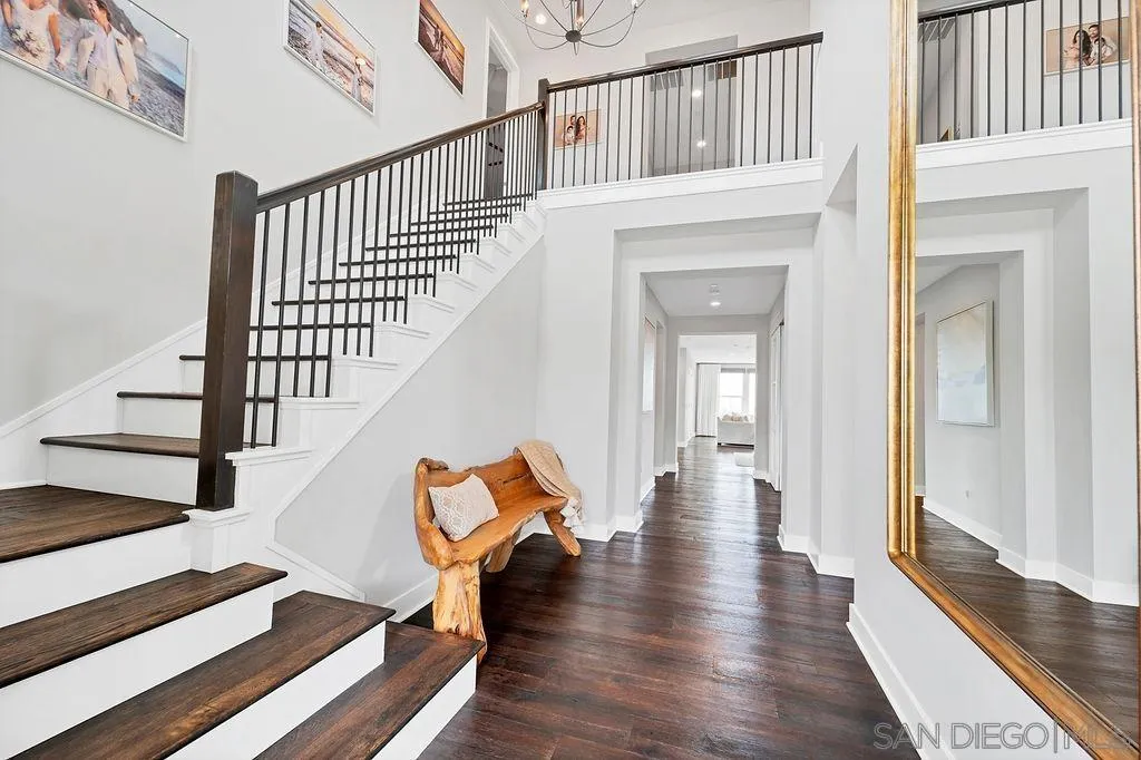 896 Channel Island Drive Encinitas, CA 92024 - Photo 4 of 51 a view of staircase with wooden floor and a rug