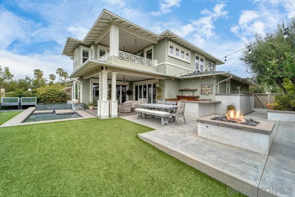 896 Channel Island Drive Encinitas, CA 92024 - Photo 41 of 51 a view of a patio with table and chairs with wooden fence