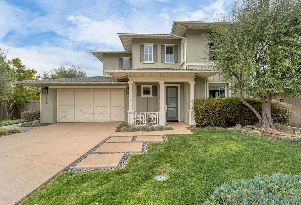 896 Channel Island Drive Encinitas, CA 92024 - Photo 46 of 51 a front view of a house with a garden and plants