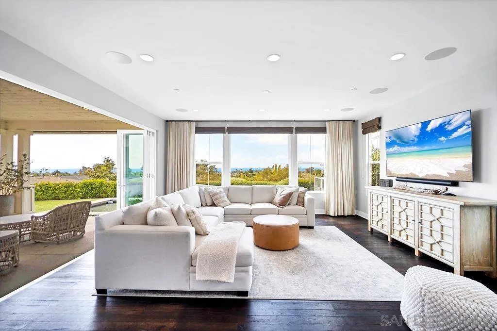 896 Channel Island Drive Encinitas, CA 92024 - Photo 6 of 51 a living room with furniture and a large window