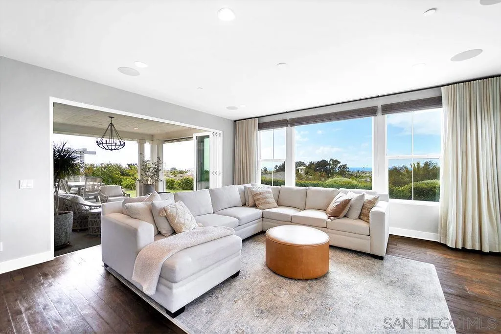 896 Channel Island Drive Encinitas, CA 92024 - Photo 8 of 51 a living room with furniture and a large window
