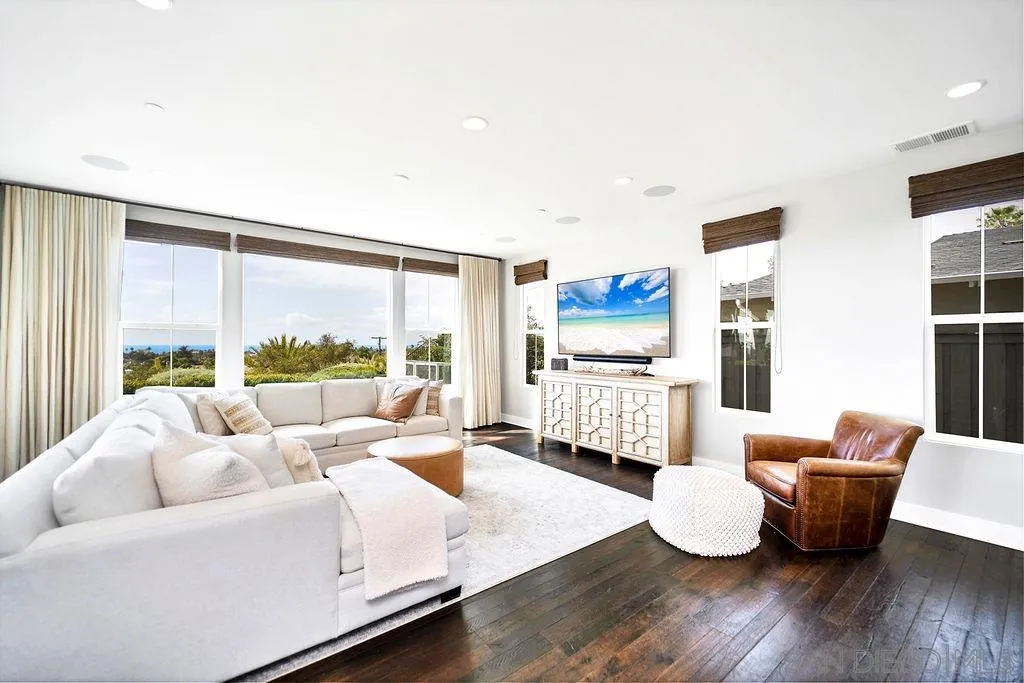 896 Channel Island Drive Encinitas, CA 92024 - Photo 9 of 51 a living room with furniture and a large window