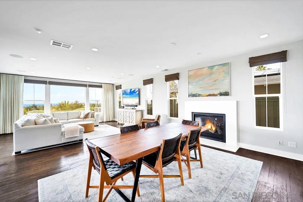 896 Channel Island Drive Encinitas, CA 92024 - Photo 10 of 51 a living room with furniture and a fireplace