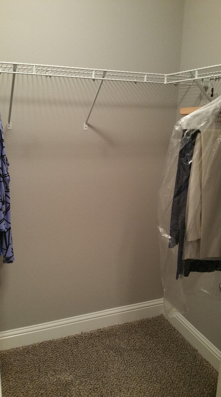 6007 Walk Along Way Crestview, FL 32536 - Photo 18 of 39 a view of a room with racks on the wall