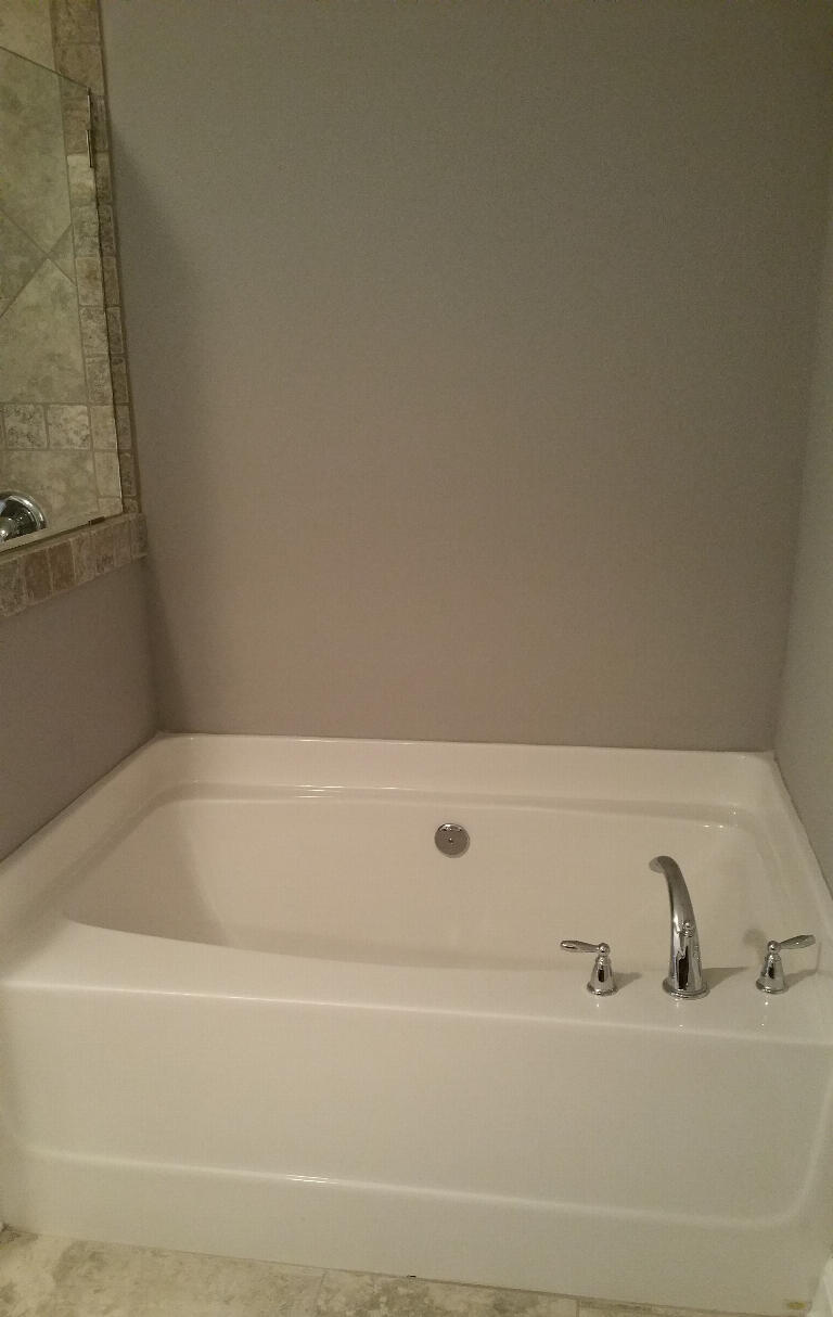 6007 Walk Along Way Crestview, FL 32536 - Photo 21 of 39 a bathroom with a bathtub