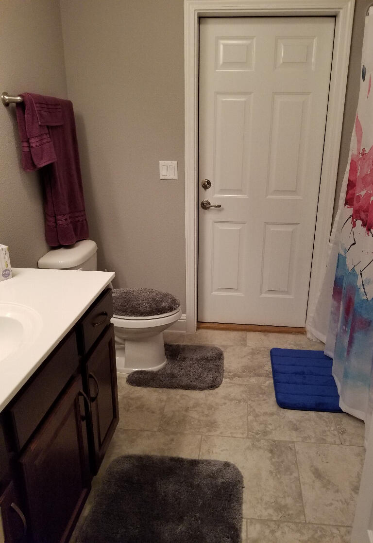 6007 Walk Along Way Crestview, FL 32536 - Photo 27 of 39 a bathroom with a sink and a mirror