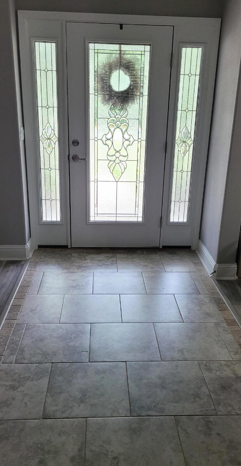 6007 Walk Along Way Crestview, FL 32536 - Photo 4 of 39 a view of an empty room with a window