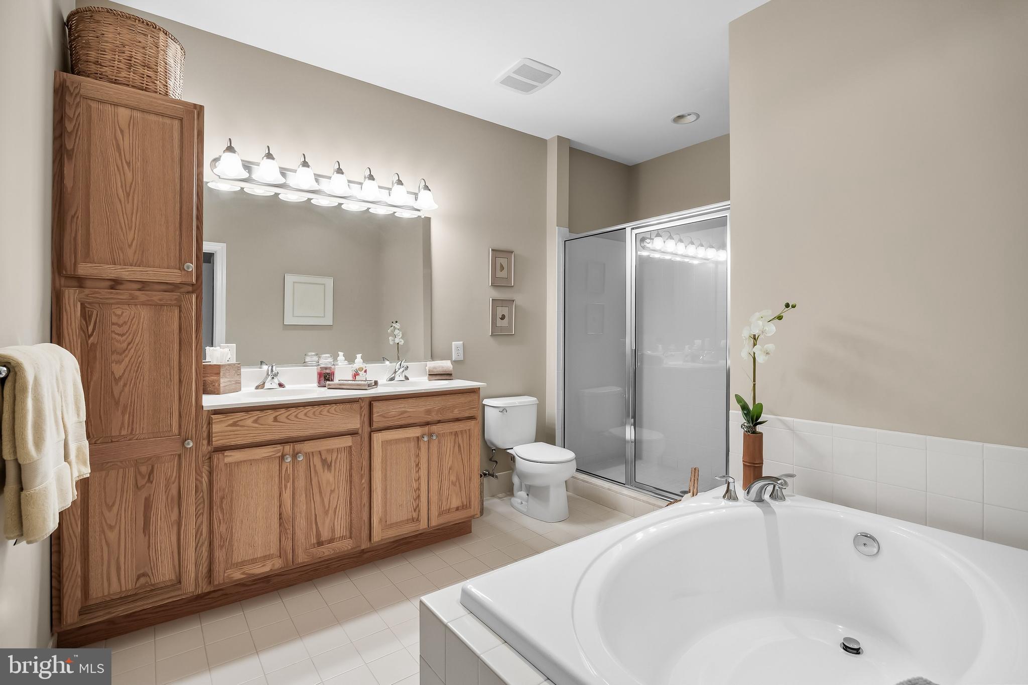 5 Collins Mill Court Moorestown, NJ 08057 - Photo 25 of 49 a bathroom with a tub sink and mirror