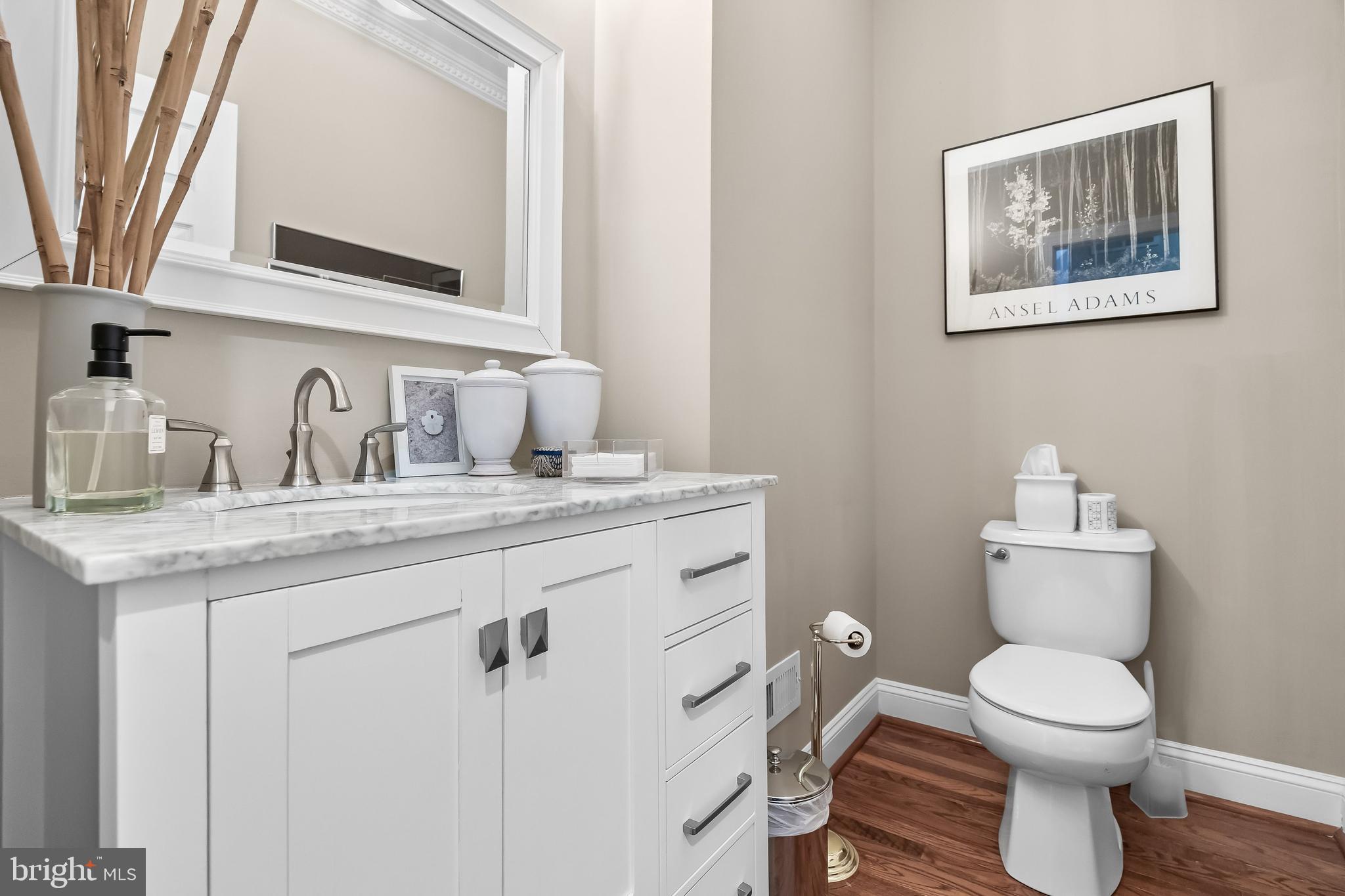 5 Collins Mill Court Moorestown, NJ 08057 - Photo 26 of 49 a bathroom with a granite countertop toilet sink and mirror