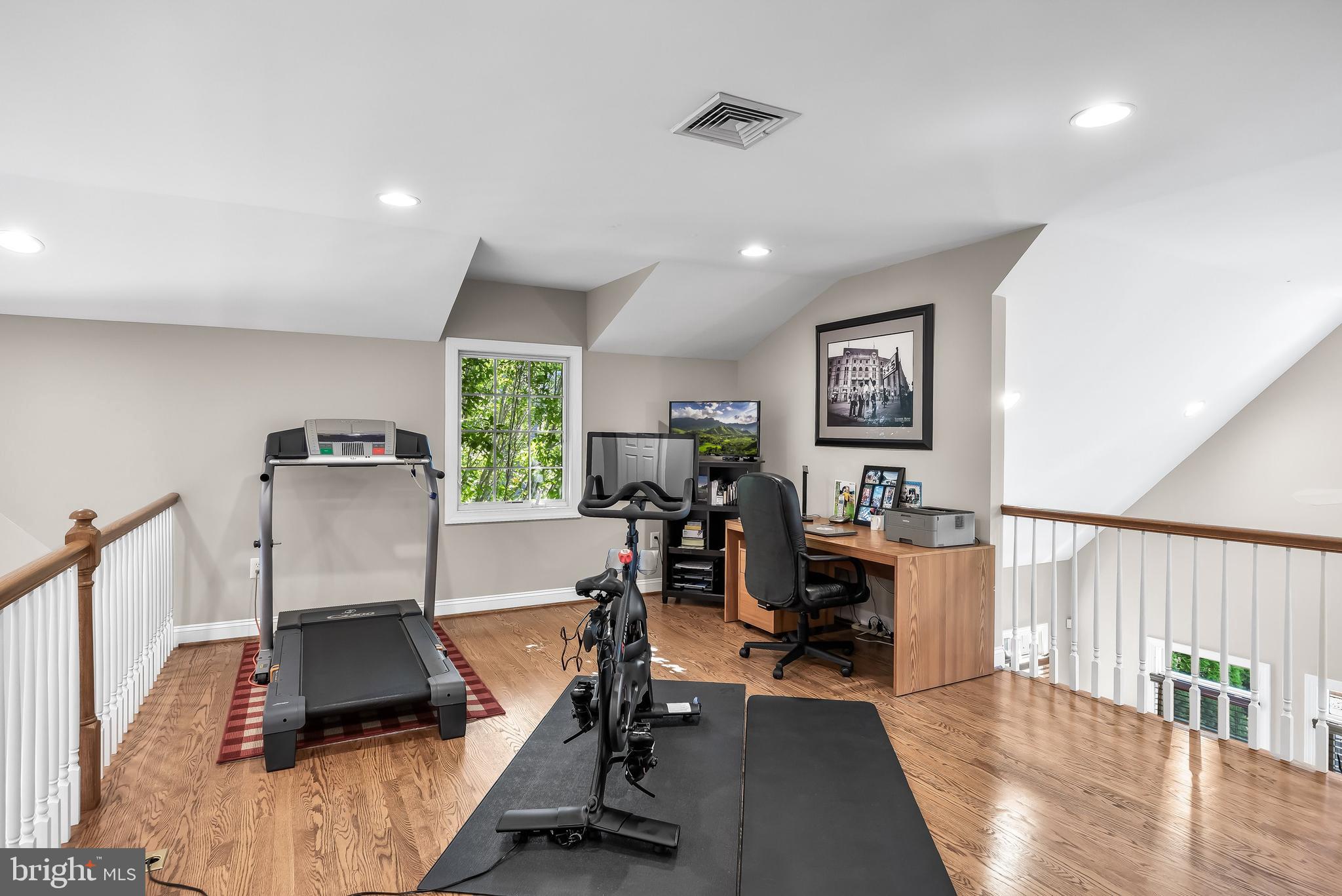 5 Collins Mill Court Moorestown, NJ 08057 - Photo 27 of 49 a view of a workspace with furniture and a gym cycle