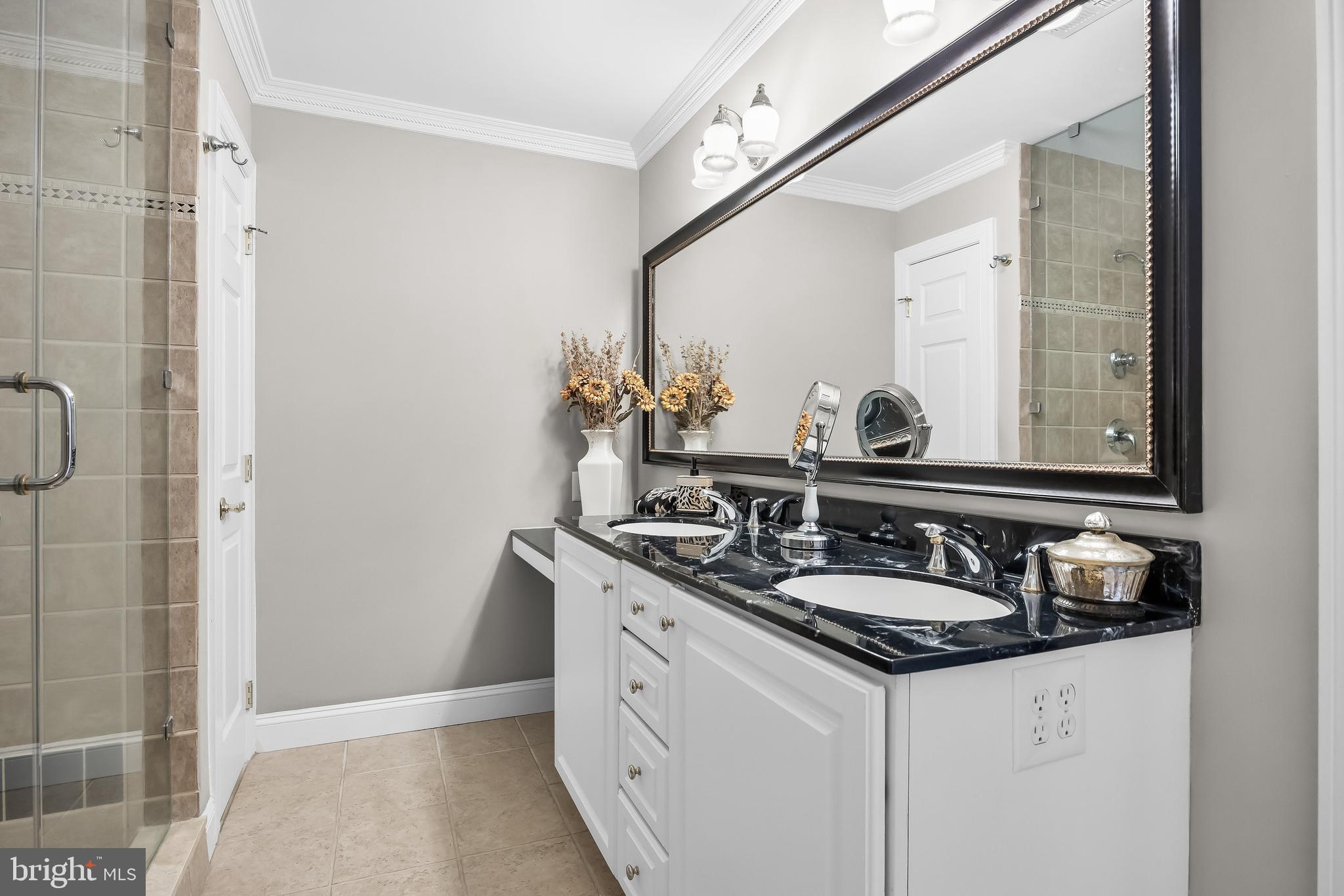 5 Collins Mill Court Moorestown, NJ 08057 - Photo 30 of 49 a bathroom with a granite countertop sink and a mirror