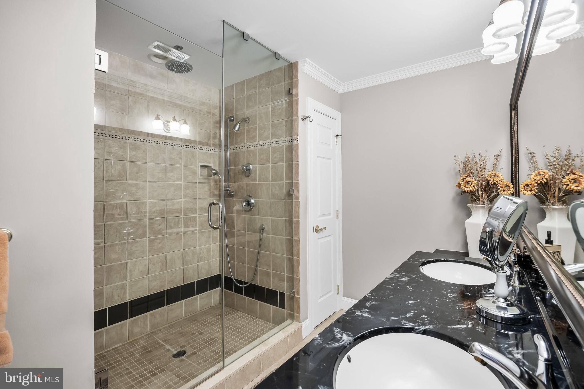 5 Collins Mill Court Moorestown, NJ 08057 - Photo 31 of 49 a bathroom with a sink a toilet and shower