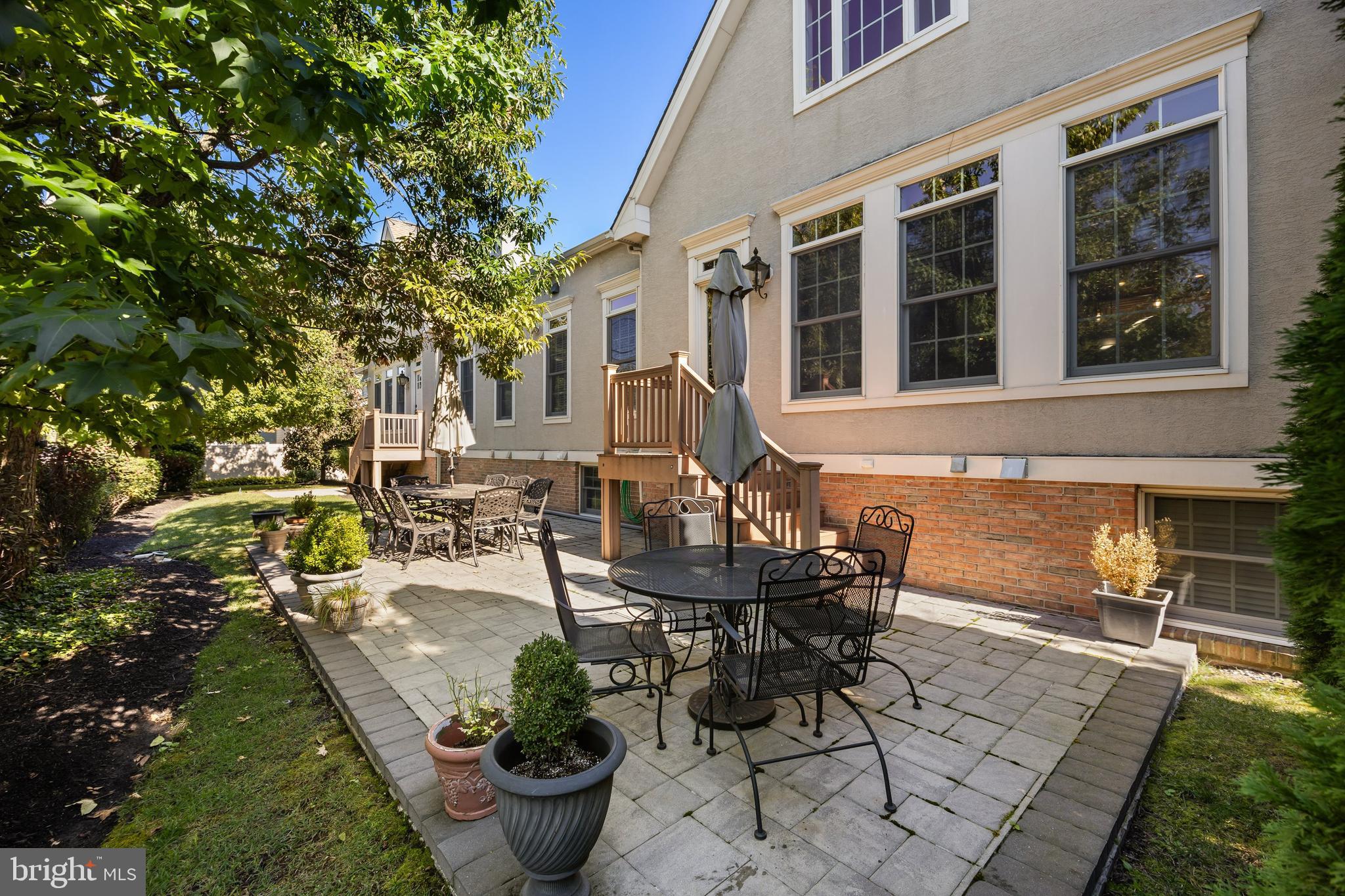 5 Collins Mill Court Moorestown, NJ 08057 - Photo 39 of 49 a view of a patio with chairs and potted plants