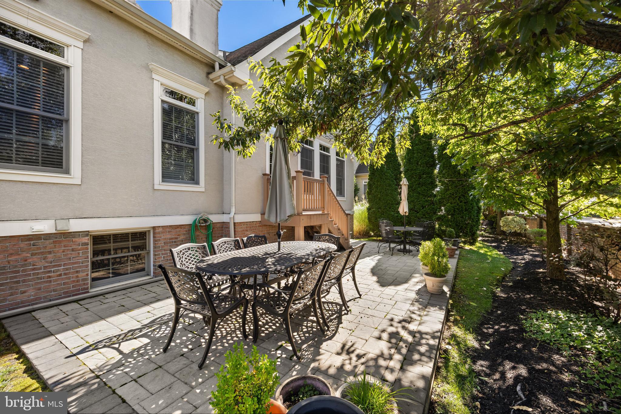 5 Collins Mill Court Moorestown, NJ 08057 - Photo 40 of 49 a view of a patio with table and chairs and potted plants