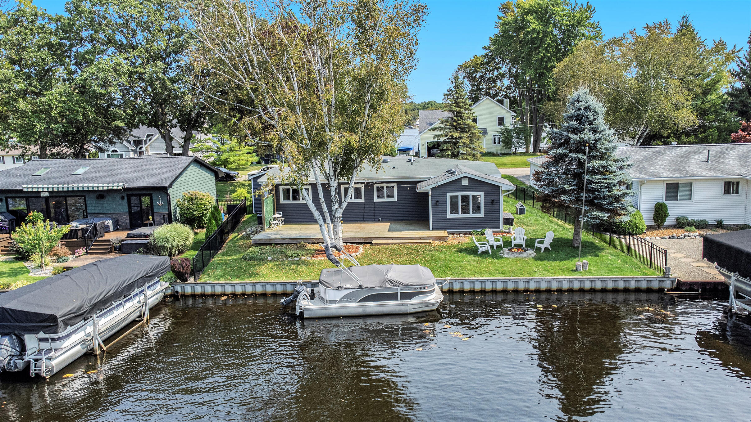 11254 Colony Pinckney, MI 48169 - Photo 11 of 61 aerial canal side close up