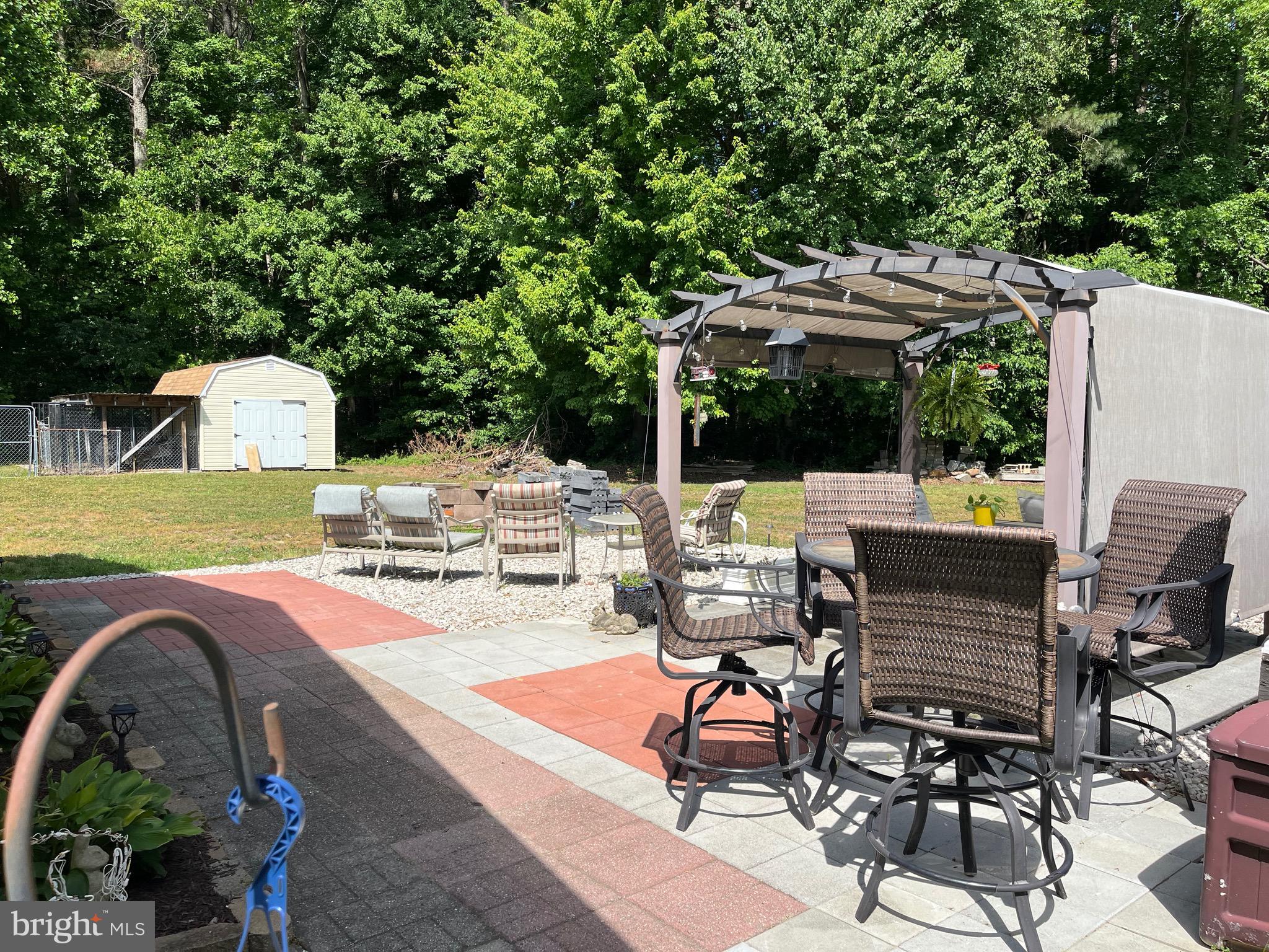 2407 Hunting Quarter Road Houston, DE 19954 - Photo 16 of 17 Patio with Pergola