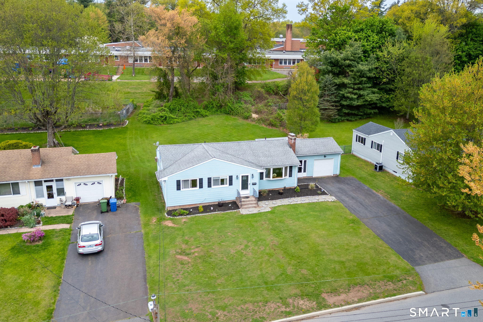 325 Barbara Road Middletown, CT 06457 - Photo 36 of 40 an aerial view of a house with garden space and street view
