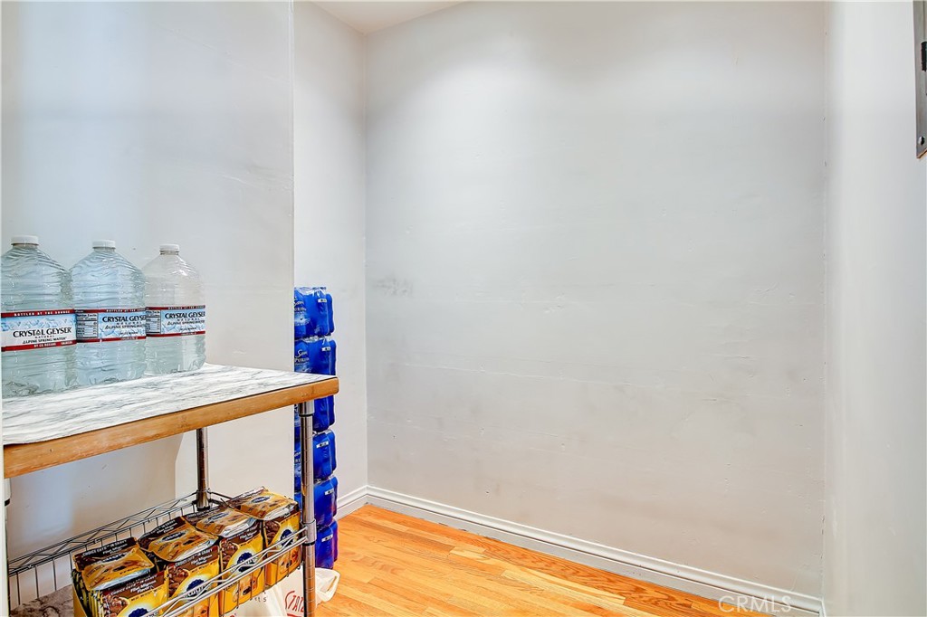 4662 Sierra Street Riverside, CA 92504 - Photo 19 of 41 a room with a table and flowerpot