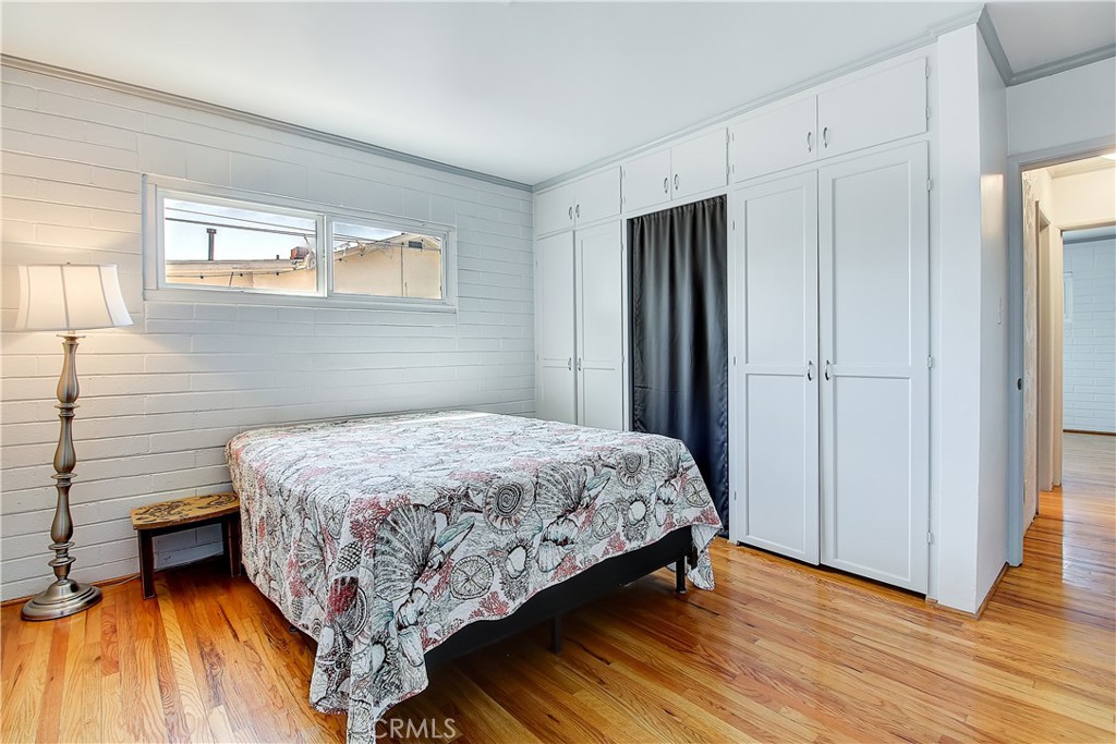 4662 Sierra Street Riverside, CA 92504 - Photo 21 of 41 a bedroom with a bed and a window