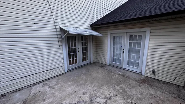 a view of a house with white door