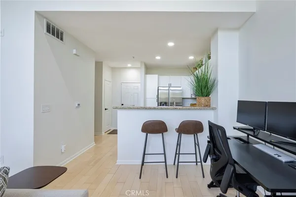 a view of a window and a tree