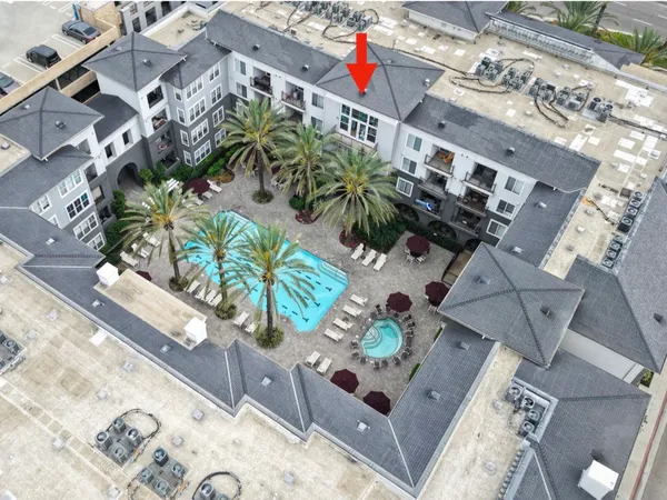 a kitchen with a sink and a refrigerator