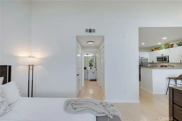 a living room with furniture and flat screen tv