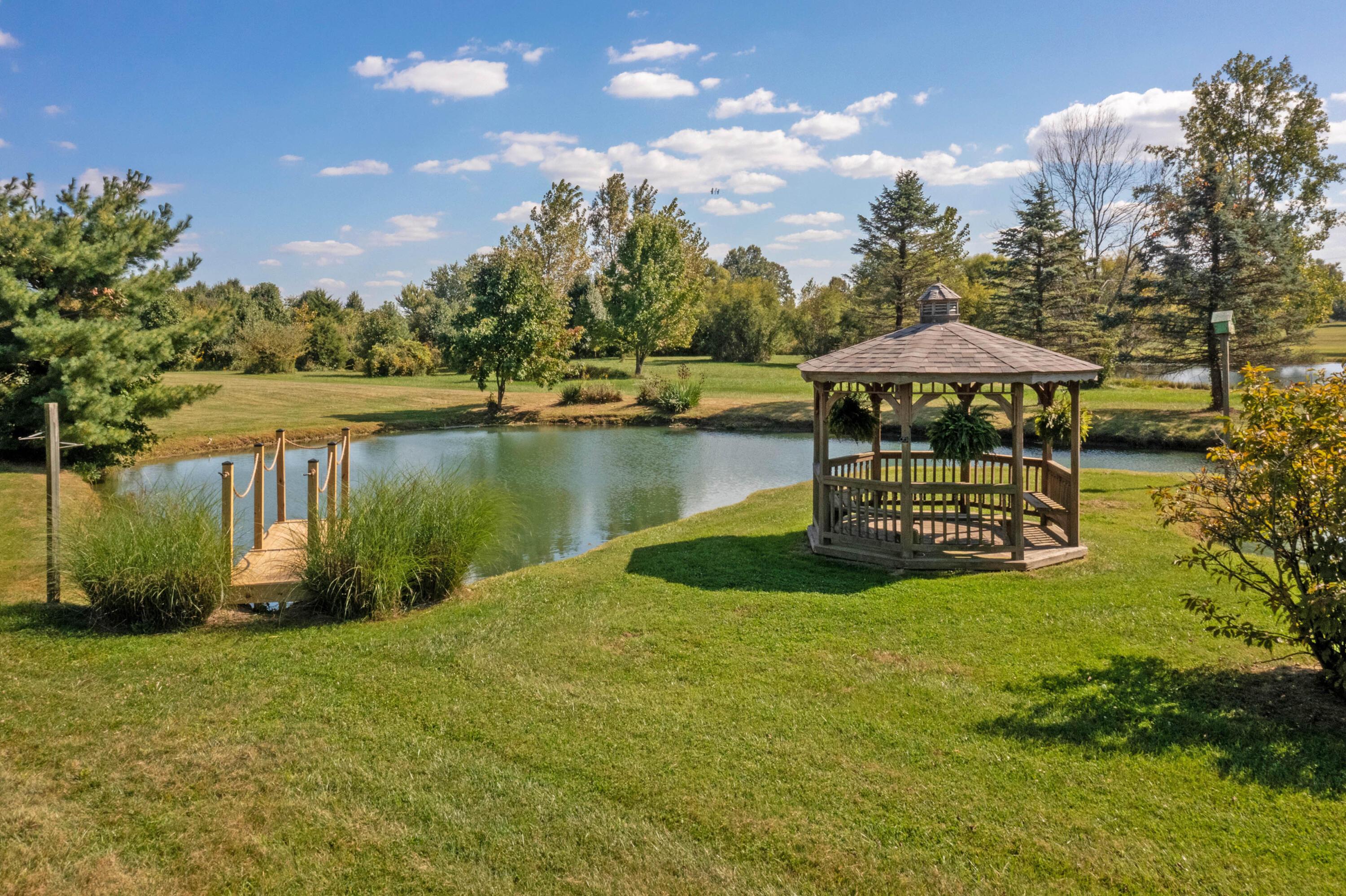 4947 Summit Road Southwest Pataskala, OH 43062 - Photo 35 of 38 STOCKED POND, DOCK, & GAZEBO