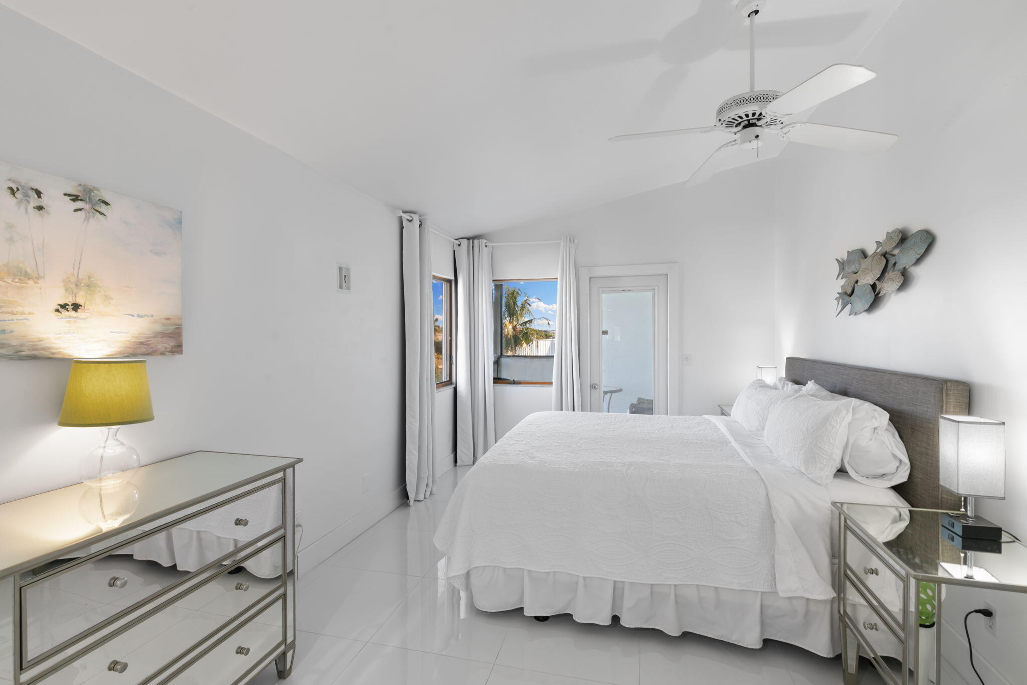 821 Palm Street Marco Island, FL 34145 - Photo 16 of 62 a bedroom with a bed and a dresser