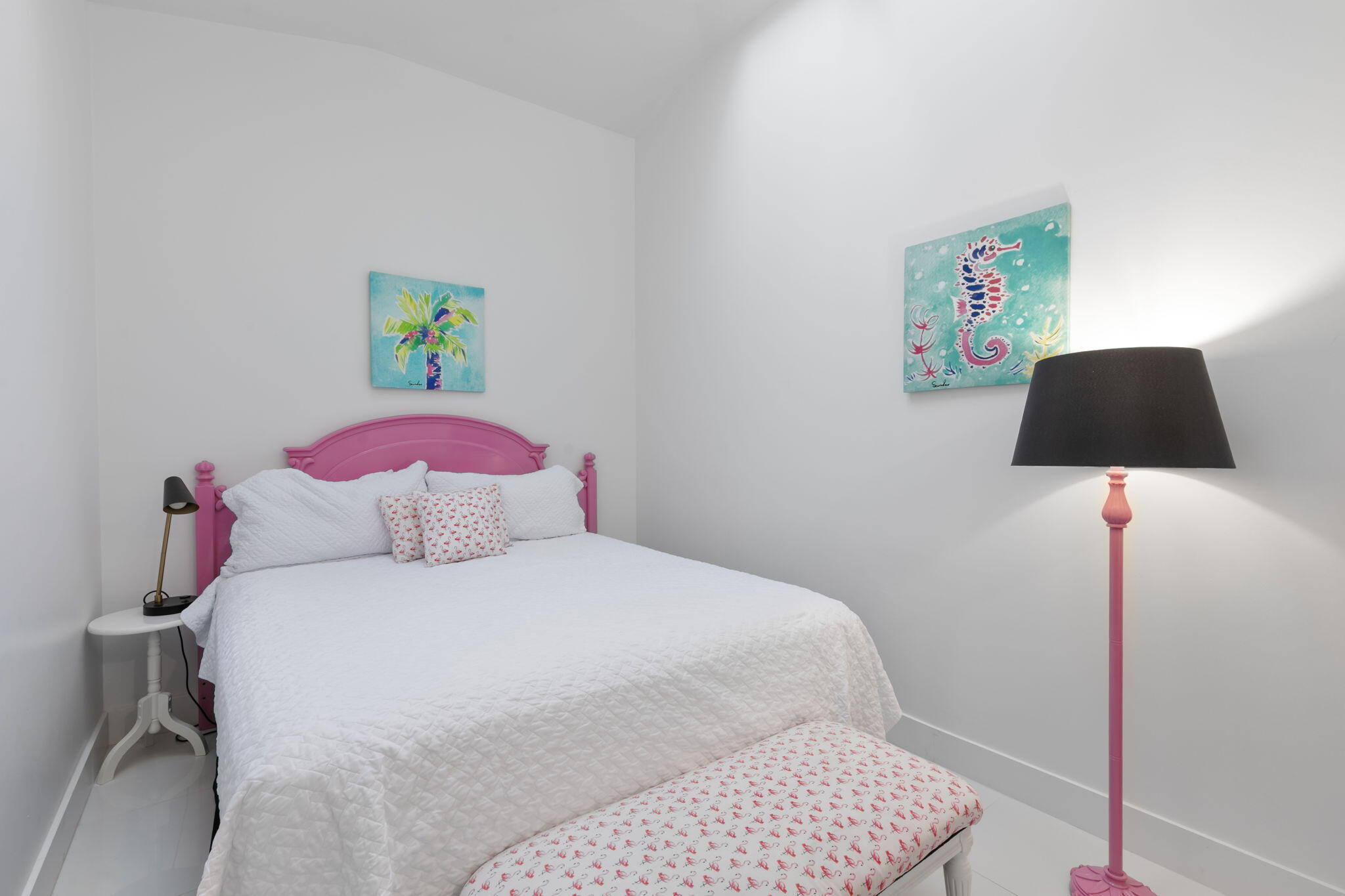 821 Palm Street Marco Island, FL 34145 - Photo 19 of 62 a bedroom with a bed and a lamp