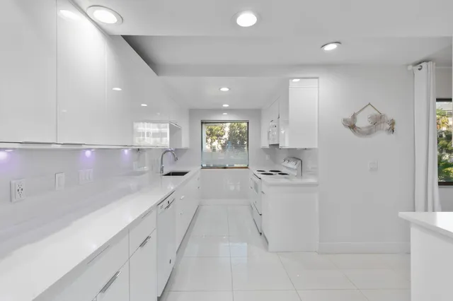 a living room with furniture and a dining table with wooden floor