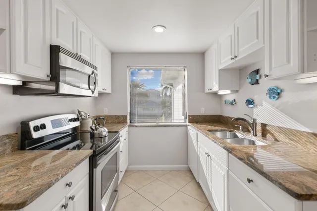 a view of a house with sitting area and furniture