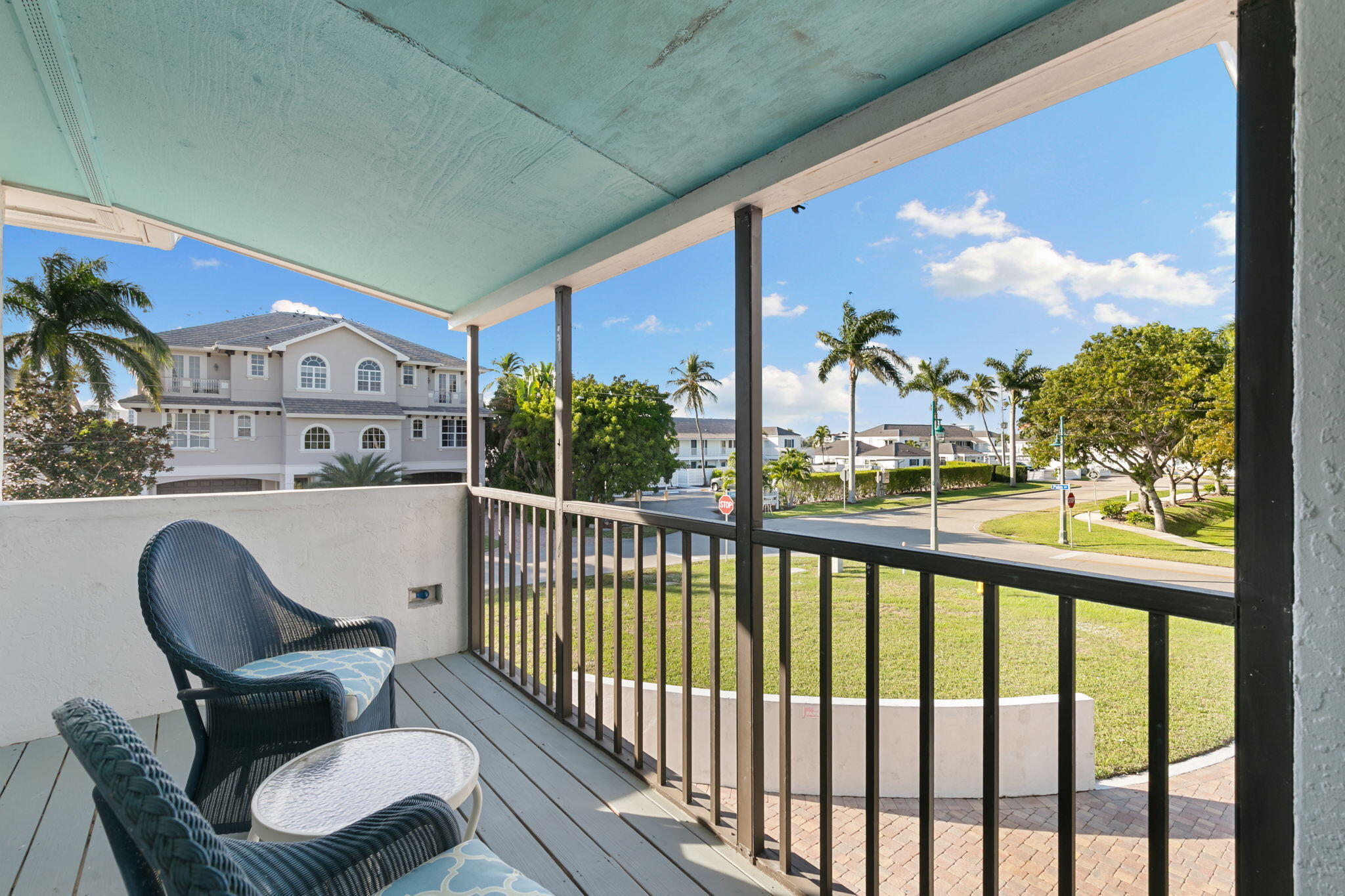 821 Palm Street Marco Island, FL 34145 - Photo 51 of 62 a view of a chairs in balcony