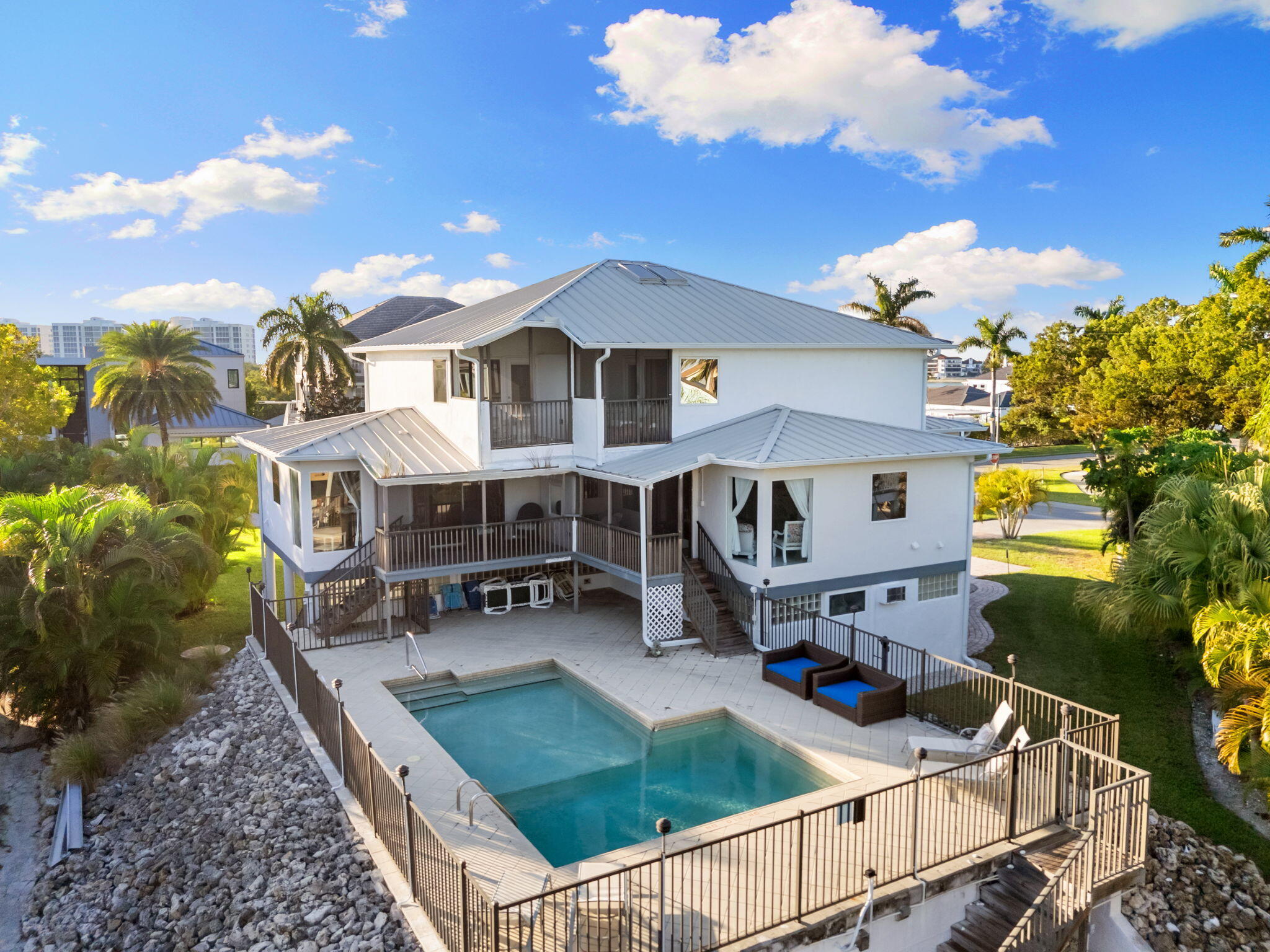 821 Palm Street Marco Island, FL 34145 - Photo 58 of 62 a view of a house with roof deck