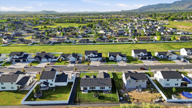 1422 West 3410th Street South Logan, UT 84321 - Photo 31 of 33 Expansive residential development featuring a structured street grid, uniform lot sizes, and a variety of contemporary home designs
