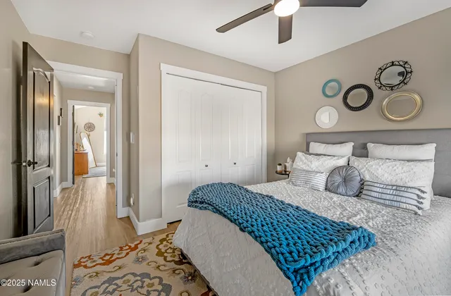 a view of a house with a snow in the background