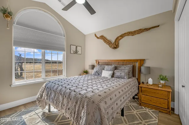 a view of parking garage with cars