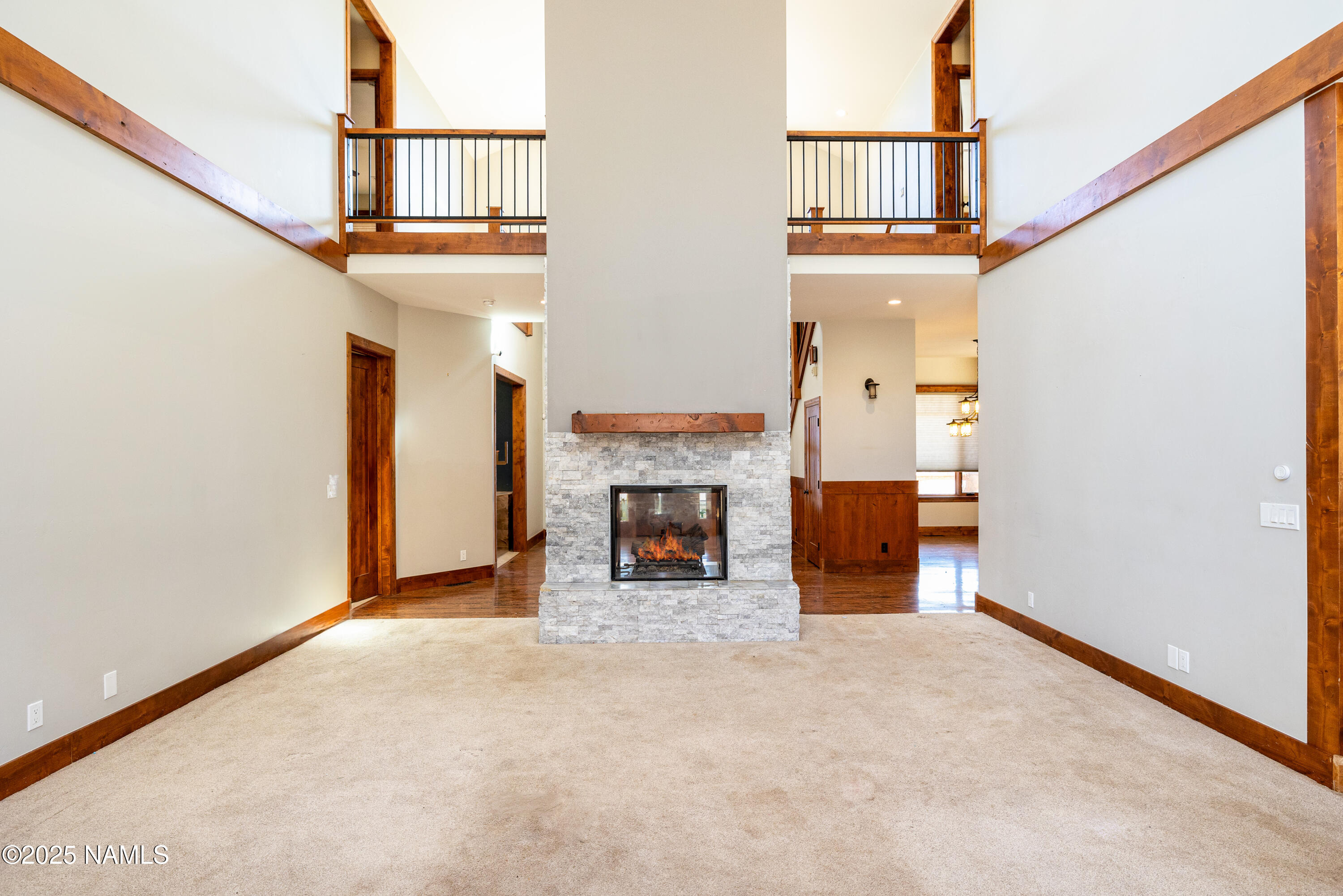 5835 Switchback Trail Flagstaff, AZ 86004 - Photo 11 of 35 a view of a livingroom with a fireplace