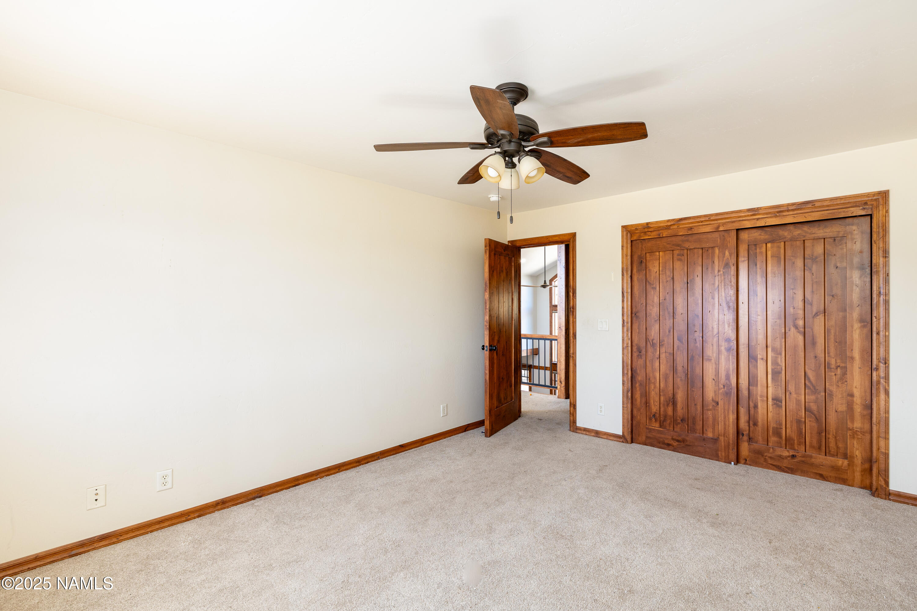 5835 Switchback Trail Flagstaff, AZ 86004 - Photo 16 of 35 wooden floor in an empty room