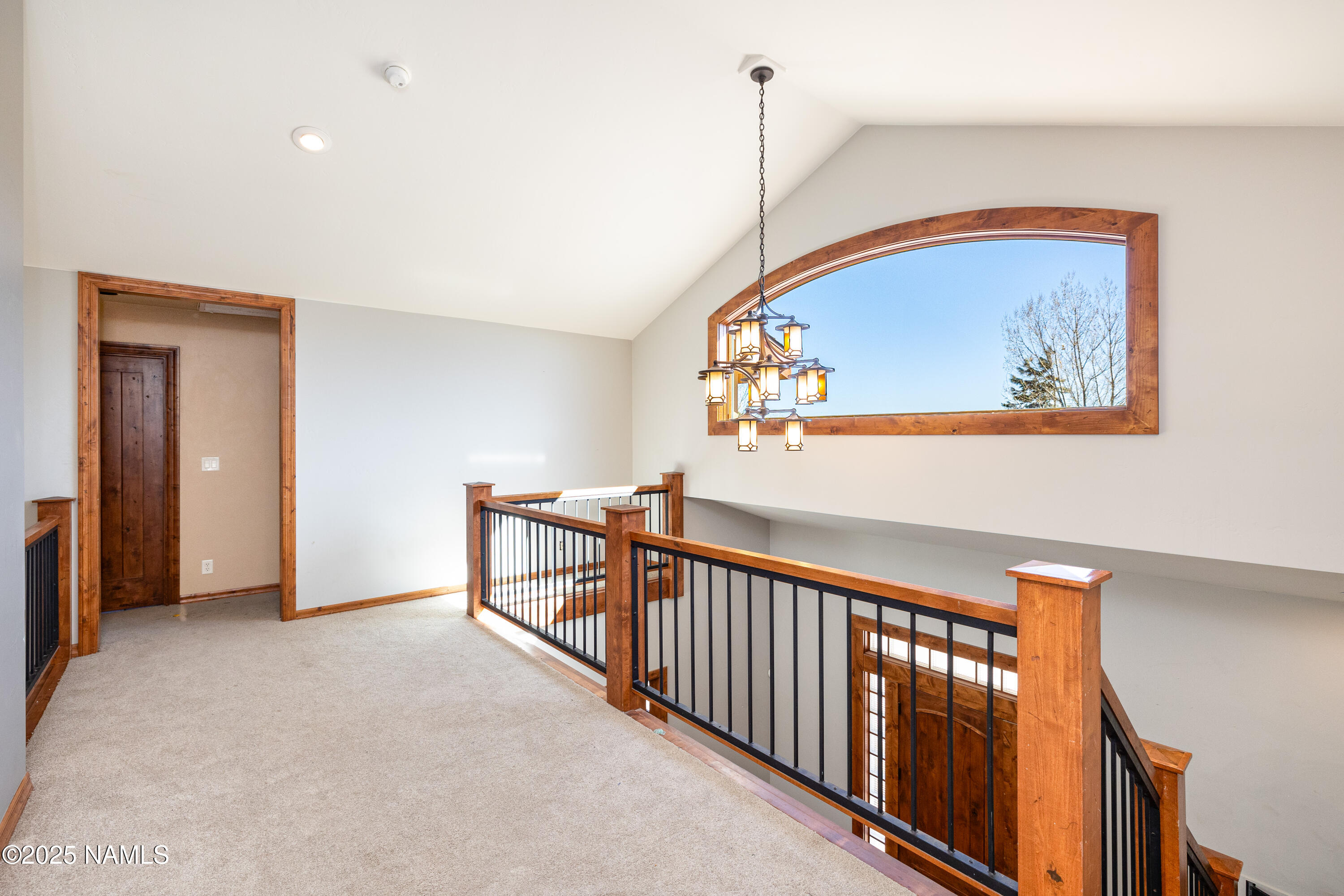 5835 Switchback Trail Flagstaff, AZ 86004 - Photo 18 of 35 a view of a hallway with a furniture