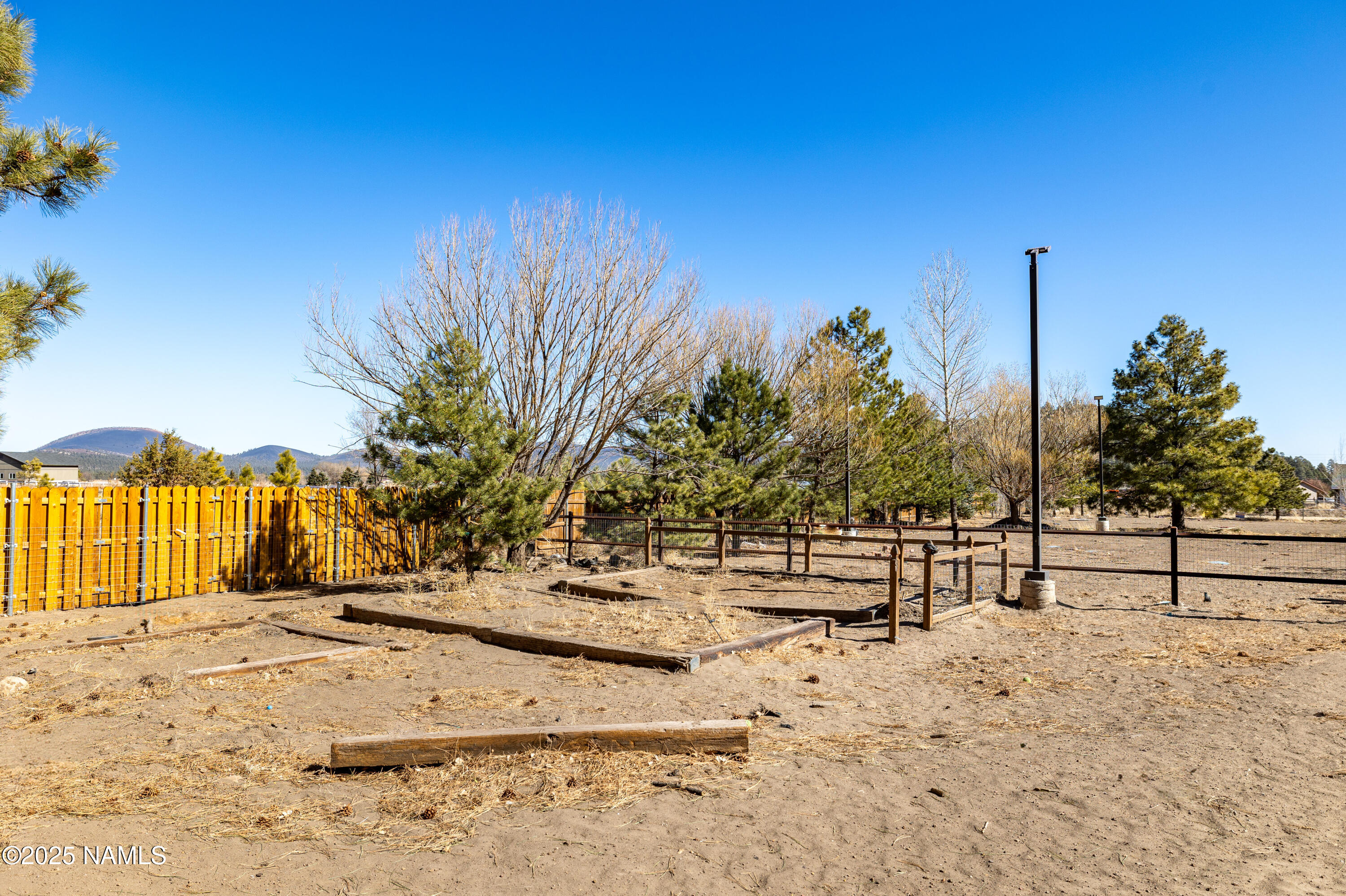 5835 Switchback Trail Flagstaff, AZ 86004 - Photo 28 of 35 a view of empty space with wooden fence