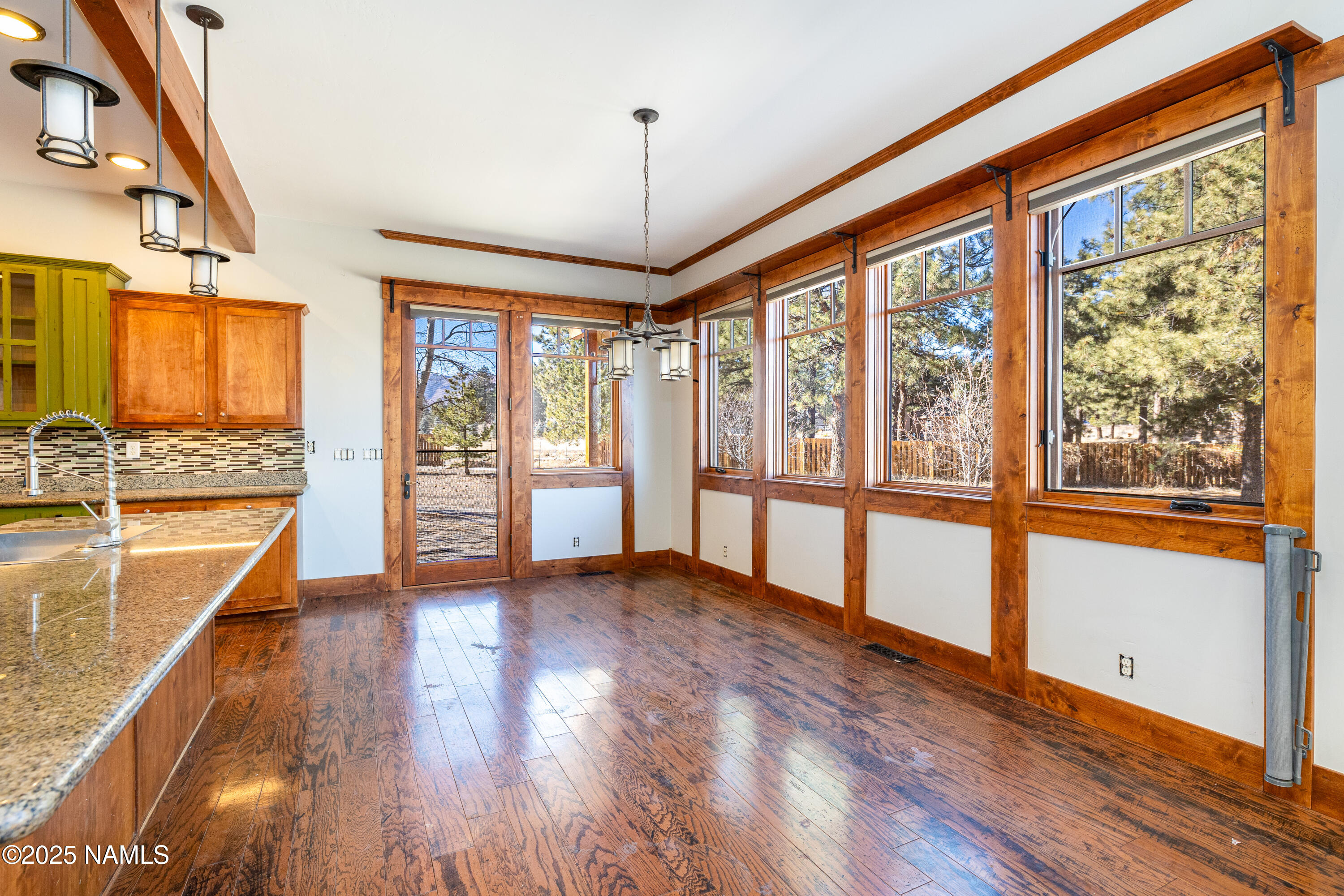 5835 Switchback Trail Flagstaff, AZ 86004 - Photo 8 of 35 a view of an entryway with wooden floor