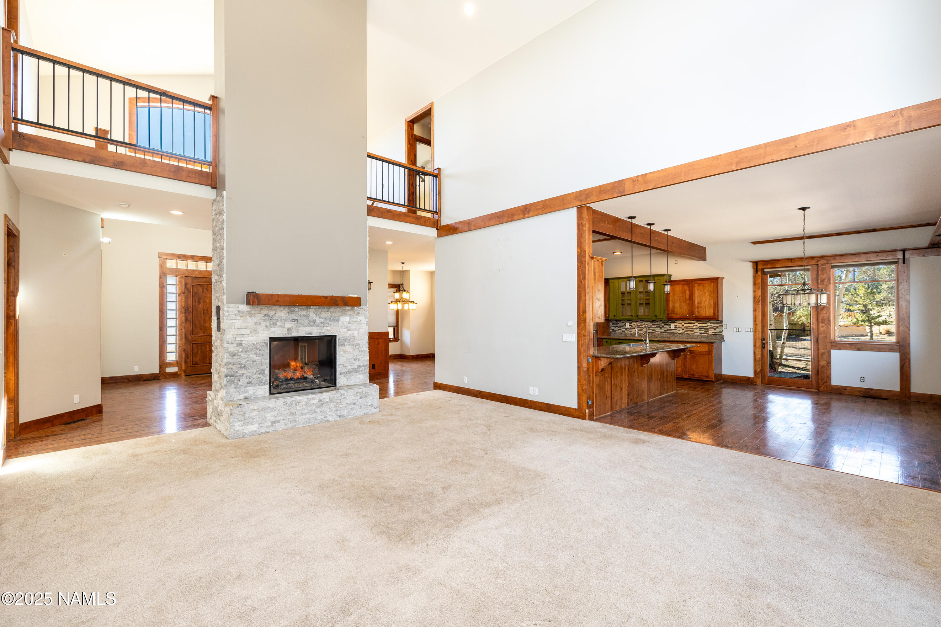 5835 Switchback Trail Flagstaff, AZ 86004 - Photo 10 of 35 a view of a livingroom with furniture and a fireplace