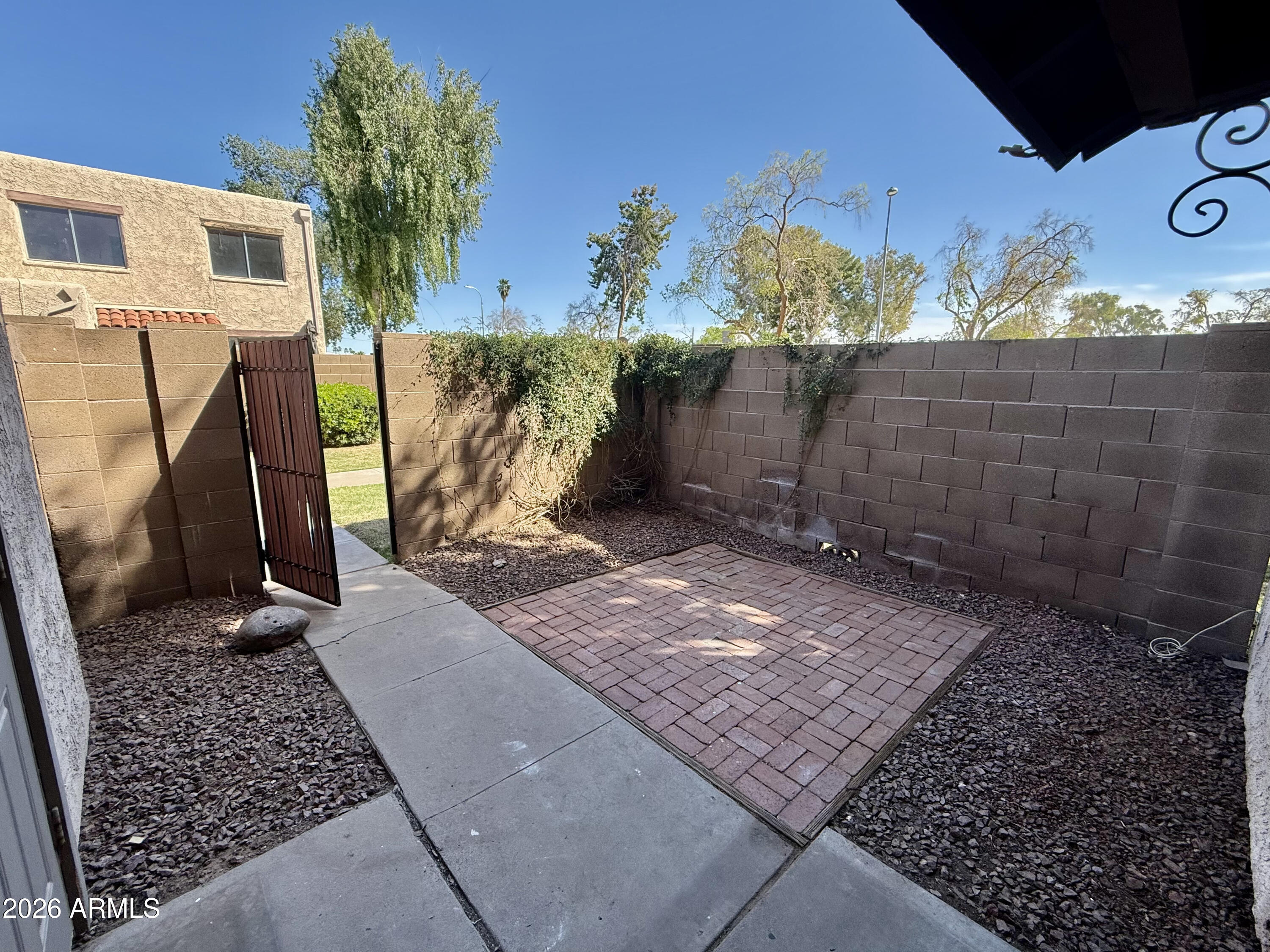 600 South Dobson Road, Unit 111 Mesa, AZ 85202 - Photo 21 of 24 a view of a yard