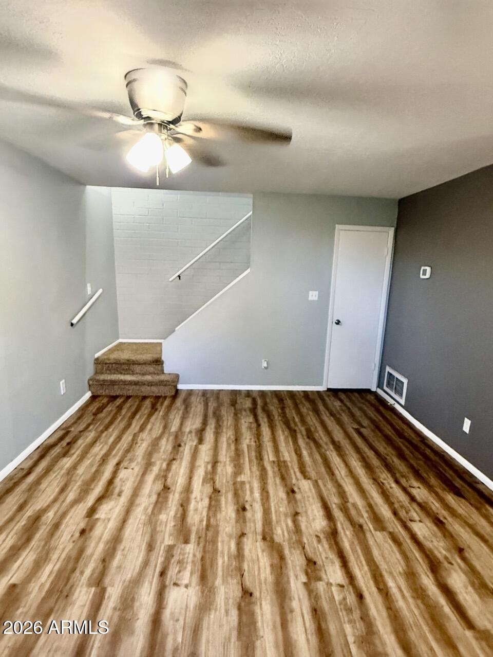 600 South Dobson Road, Unit 111 Mesa, AZ 85202 - Photo 10 of 24 a view of a room with wooden floor